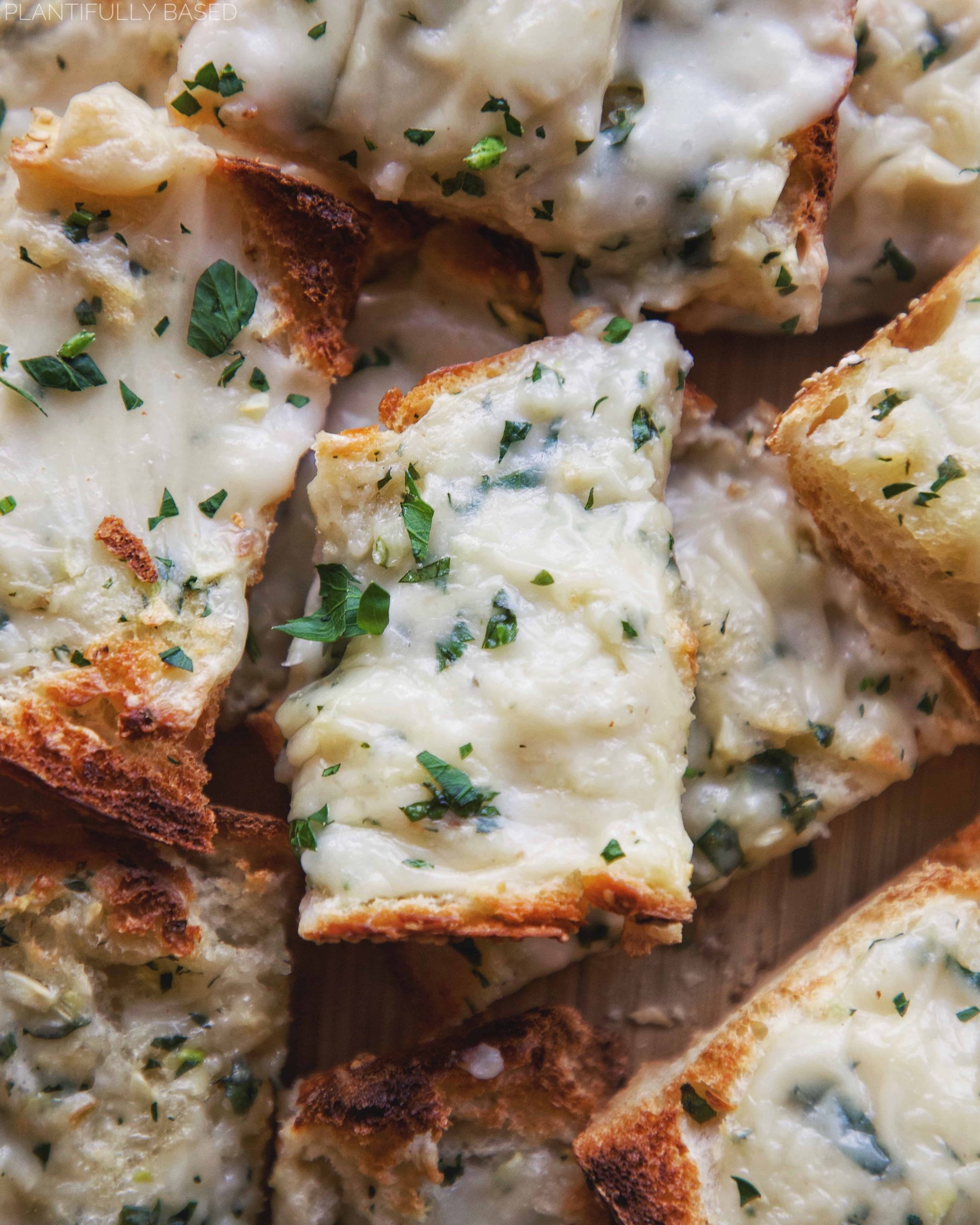 Vegan Cheesy Garlic Bread - Plantifully Based