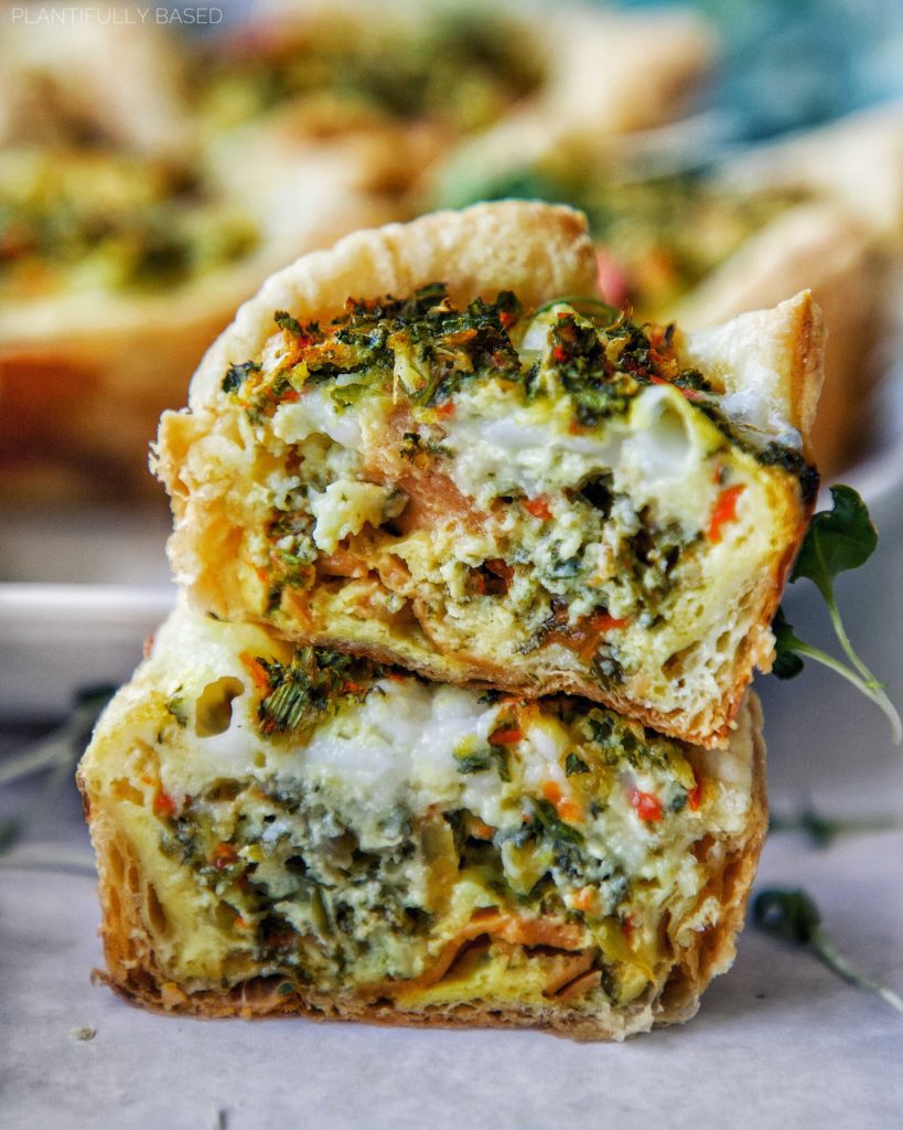 cross section of the Vegan Puff Pastry Mini Quiche, showing veggies, vegan cheese, puff pastry
