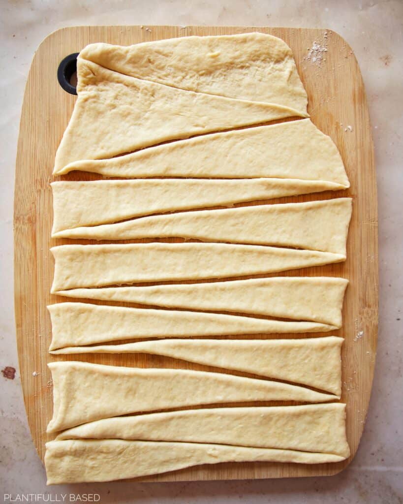 image of dough being cut into triangles
