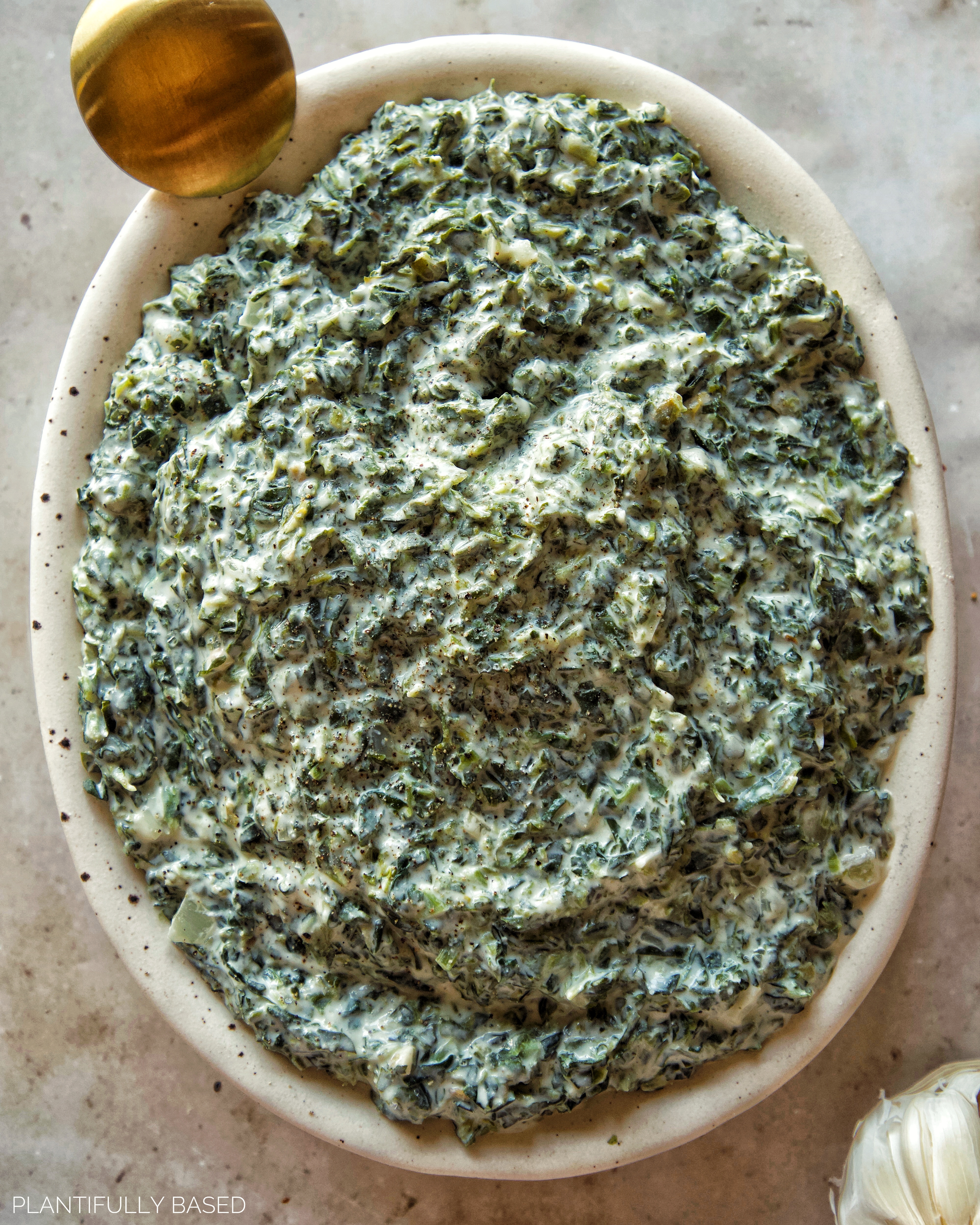 vegan creamed spinach in a dish