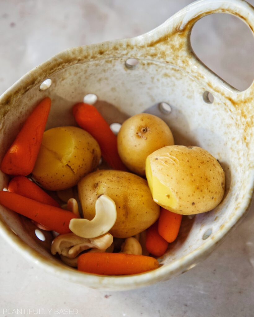 potatoes, carrots, and cashews after boiling