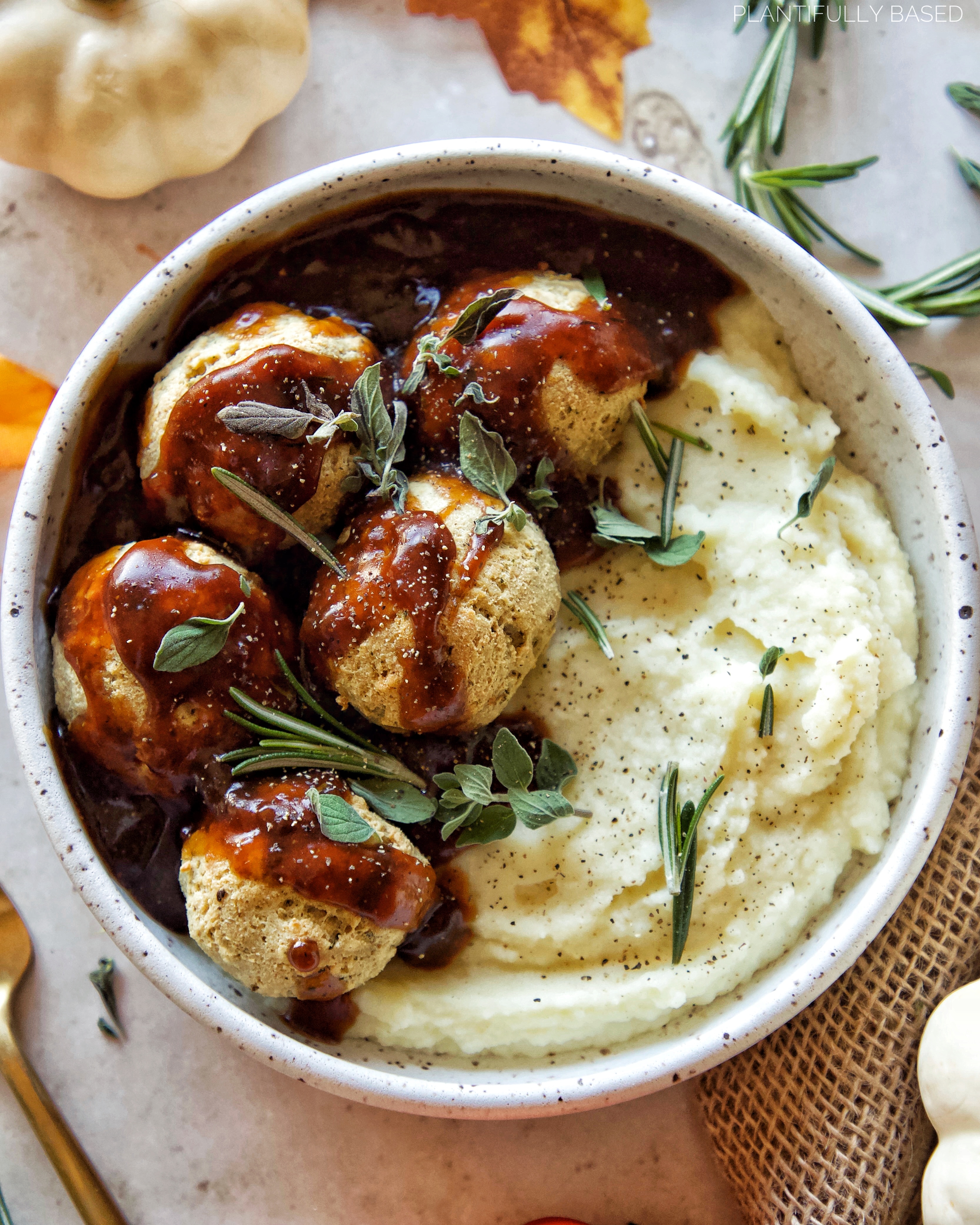 image of vegan turkey meatballs on mashed potatoes