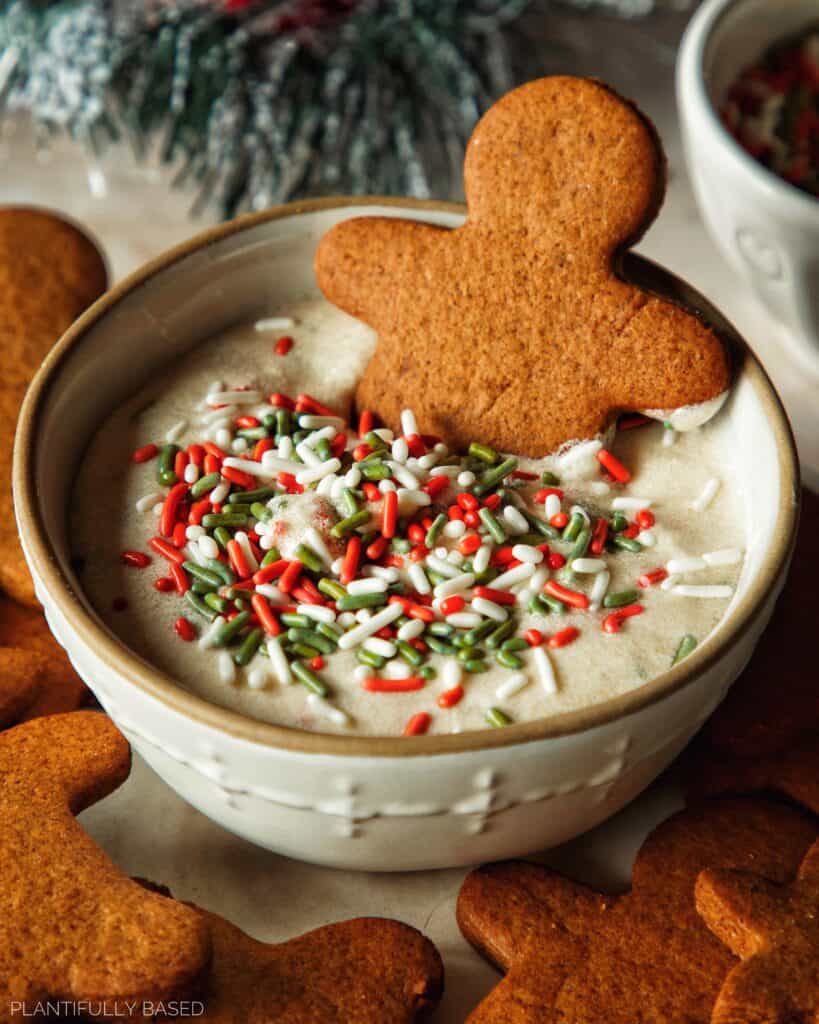 image of gingerbread cookie in sugar cookie dip