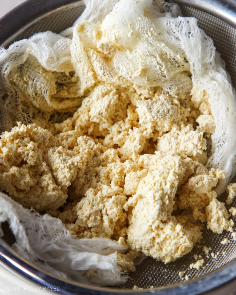 image of vegan curds in cheesecloth