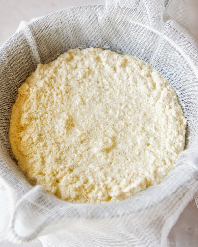 vegan curds in strainer