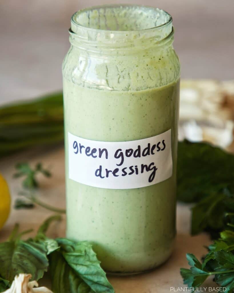 image of vegan green goddess dressing in a jar