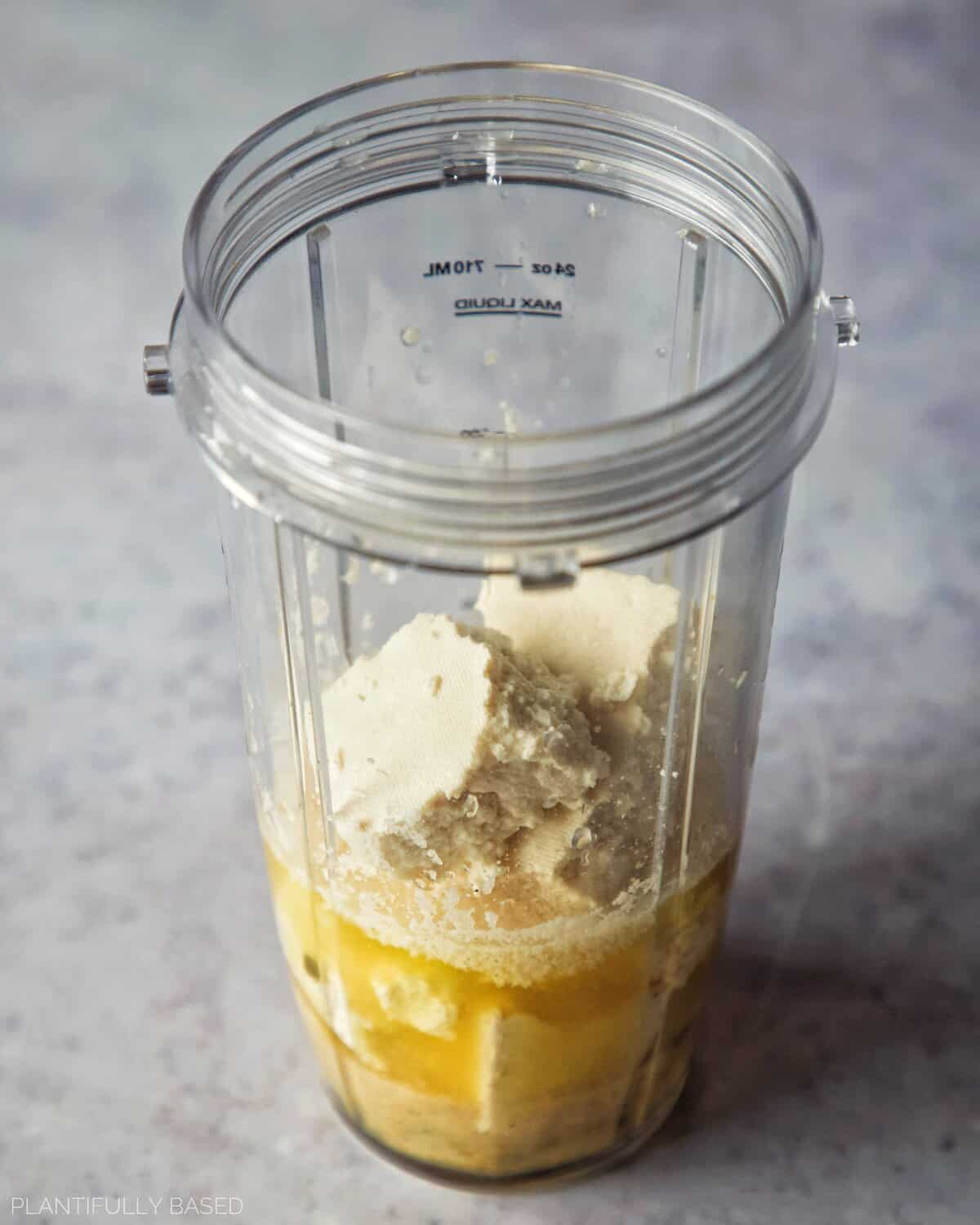 ingredients for vegan caesar salad dressing in blender