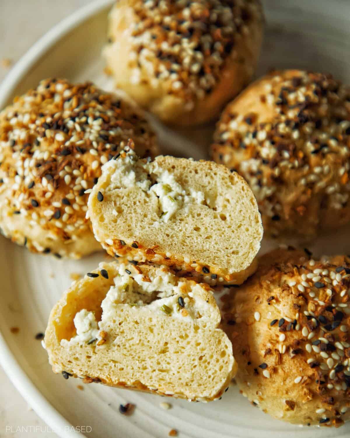 high protein bagel bites cross section with vegan cream cheese