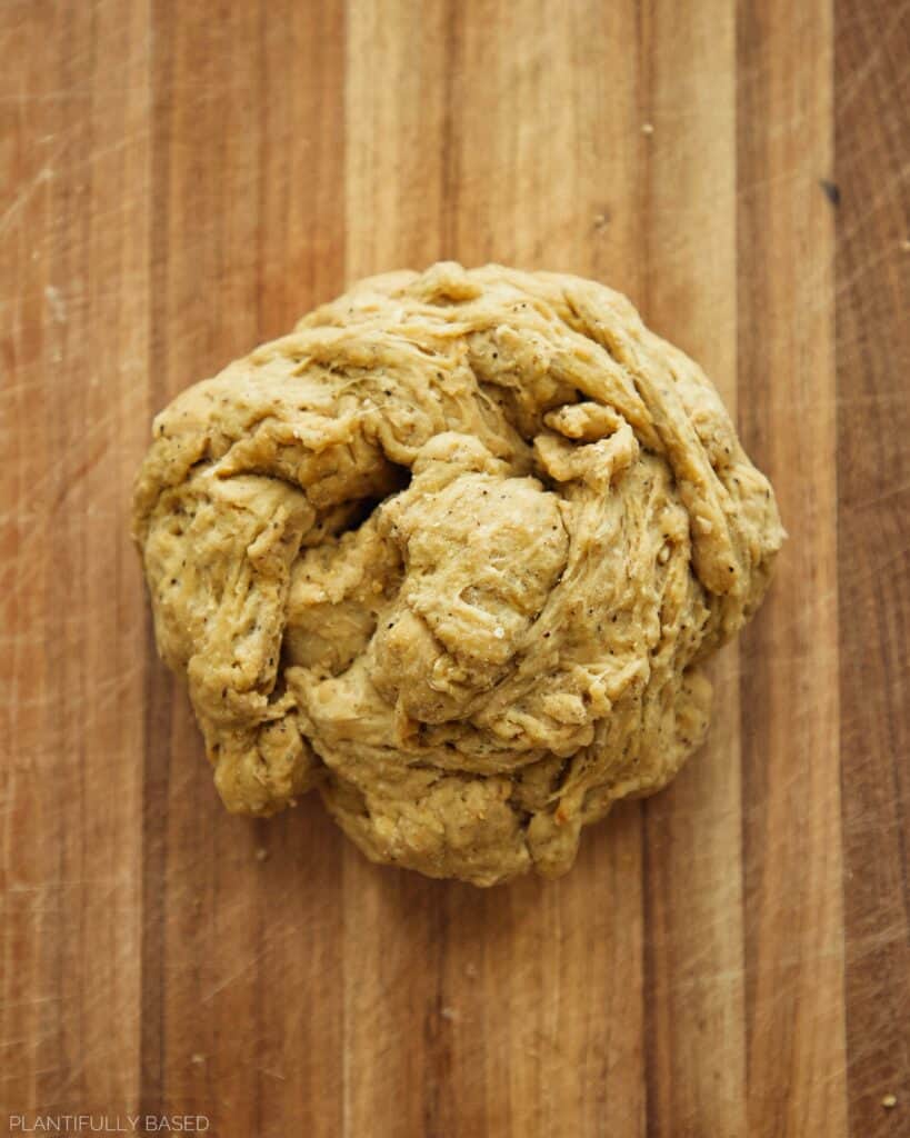kneading seitan into a ball