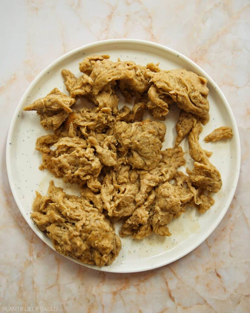removing the seitan from the pot to cool