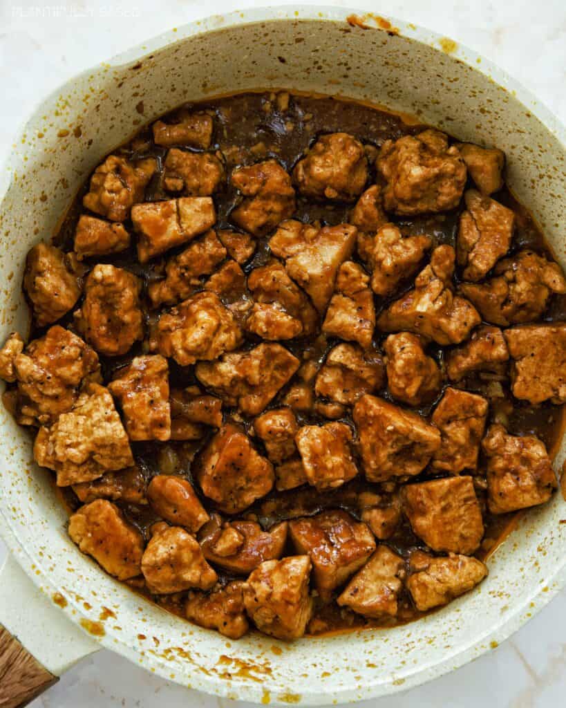 Saucy Tofu "Steak" Bits in a pan