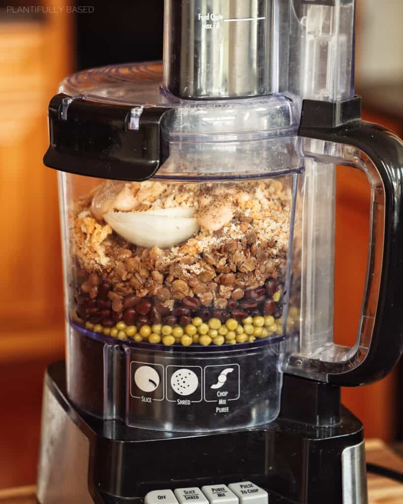 ingredients for veggie burgers in a food processor