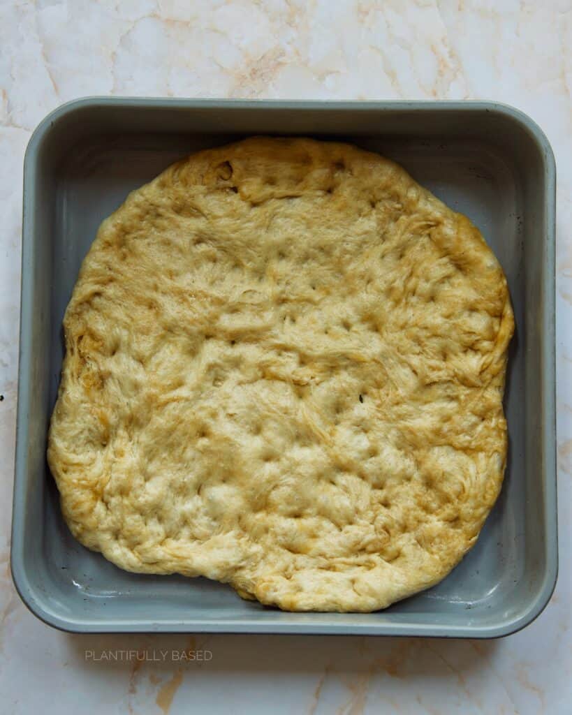 dough spread out in a pan