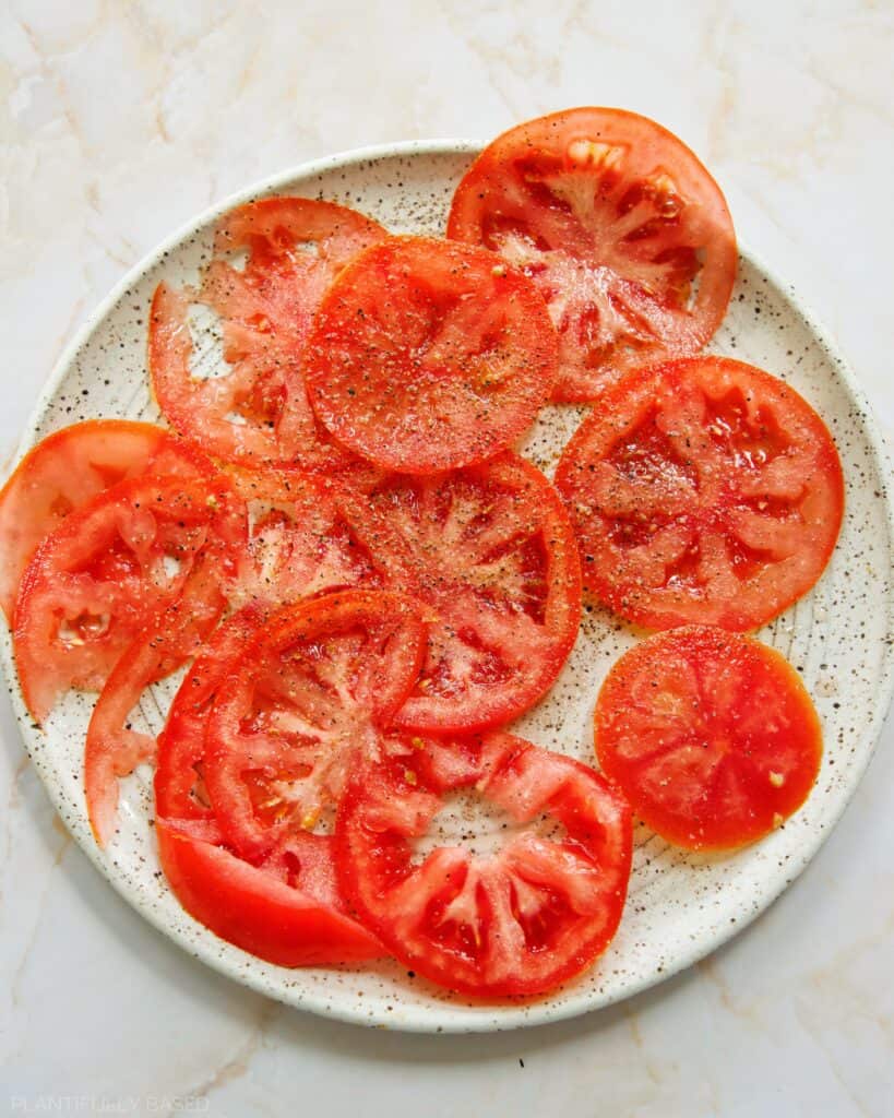 thinly sliced tomato
